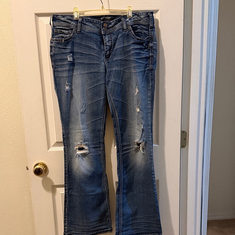 Silver Jeans Suki Distressed Blue Flare Jeans